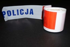 Taśma wygrodzeniowa z napisem policja